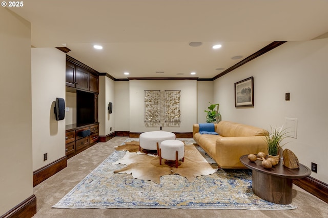 living area featuring ornamental molding, baseboards, and recessed lighting