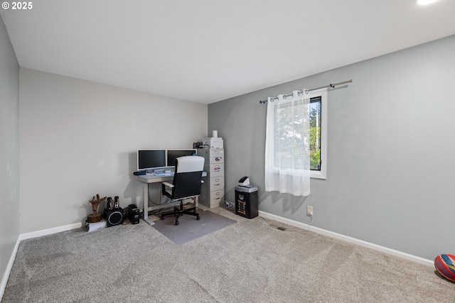 home office featuring carpet floors and baseboards