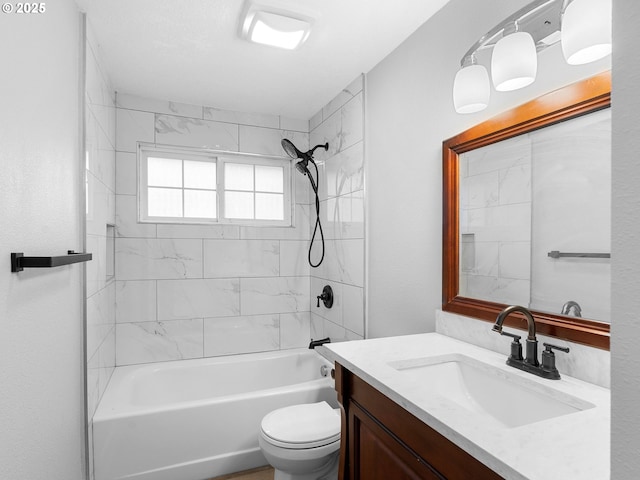 bathroom featuring  shower combination, vanity, and toilet