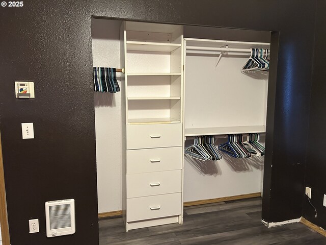 closet featuring heating unit