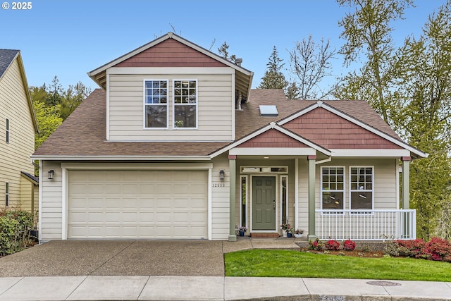 craftsman-style house with a porch, a front lawn, an attached garage, a shingled roof, and driveway