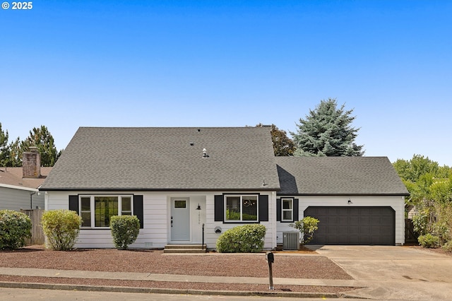 18090 NW Avalon Dr, Portland, OR 97229 - view of front facade with an attached garage, driveway, roof with shingles, and entry steps