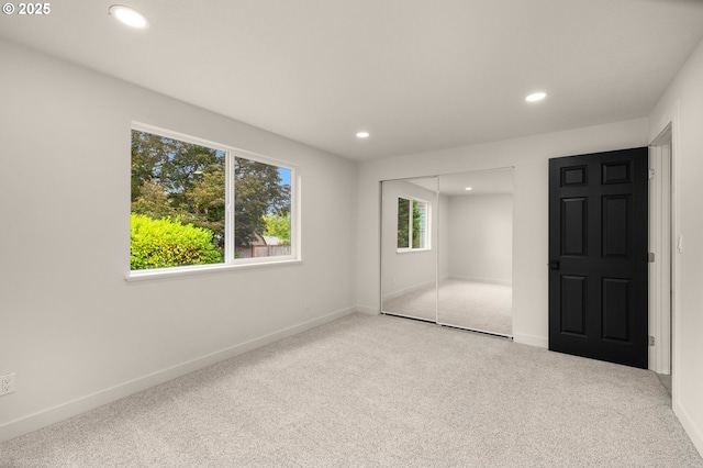 18090 NW Avalon Dr, Portland, OR 97229 - unfurnished bedroom featuring carpet flooring, recessed lighting, and a closet