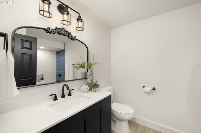 18090 NW Avalon Dr, Portland, OR 97229 - bathroom with vanity, wood finished floors, and a shower with curtain