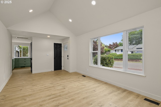 18090 NW Avalon Dr, Portland, OR 97229 - empty room with recessed lighting, high vaulted ceiling, and light wood-style flooring