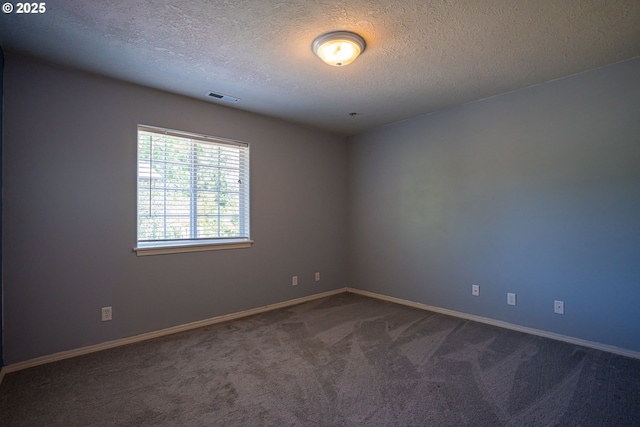2872 Bluff Ave, Salem, OR 97302 - empty room featuring carpet floors, a textured ceiling, and baseboards