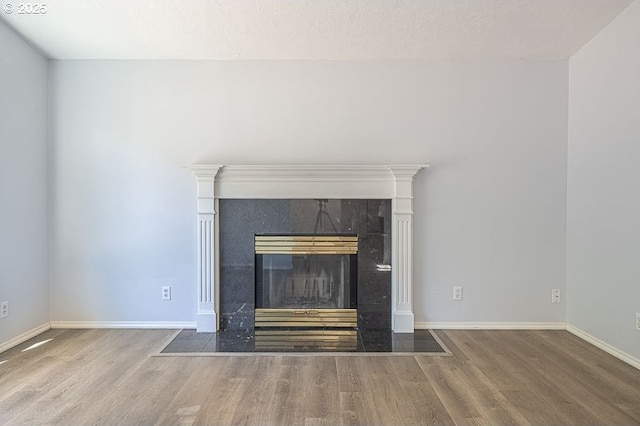 5270 Faircrest Ct SE, Salem, OR 97306 - details featuring wood finished floors, baseboards, and a fireplace