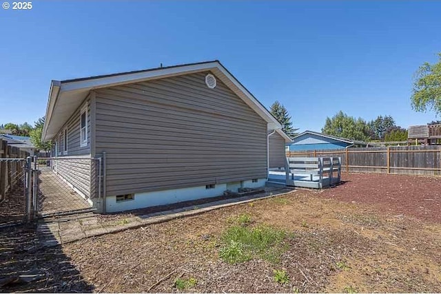 5270 Faircrest Ct SE, Salem, OR 97306 - view of property exterior featuring crawl space, a gate, and a fenced backyard