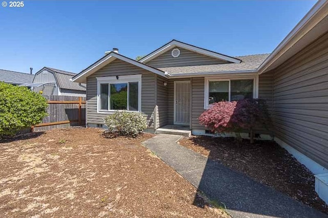 5270 Faircrest Ct SE, Salem, OR 97306 - property entrance with roof with shingles and fence