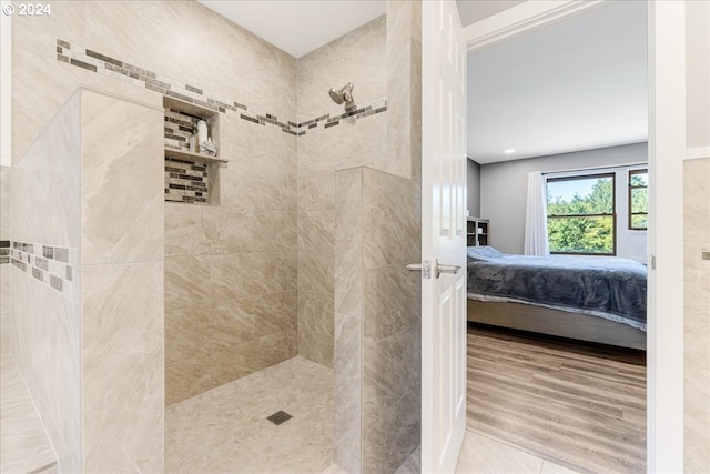 bathroom featuring a tile shower