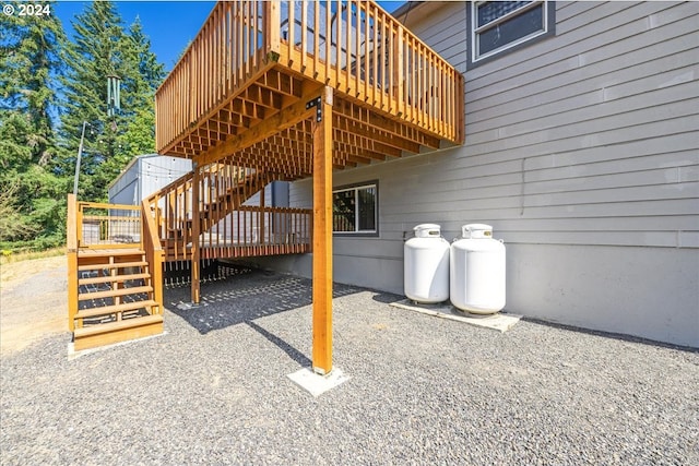 view of side of property featuring a deck