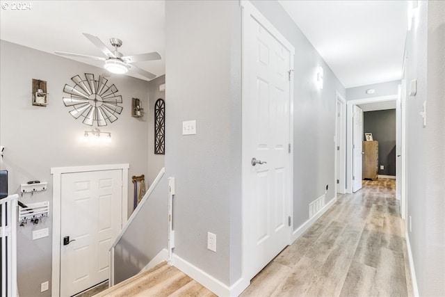 hallway featuring light hardwood / wood-style flooring