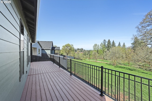 deck featuring a yard