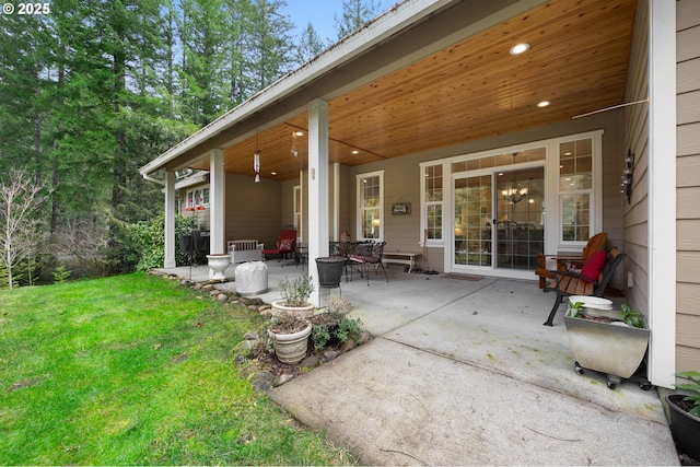 23275 E Wind Tree Loop, Rhododendron, OR 97049 - rear view of house featuring a patio and a lawn