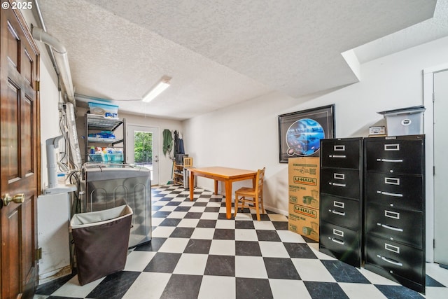 17476 SW Edy Rd, Sherwood, OR 97140 - office area with dark floors, washer / dryer, and a textured ceiling