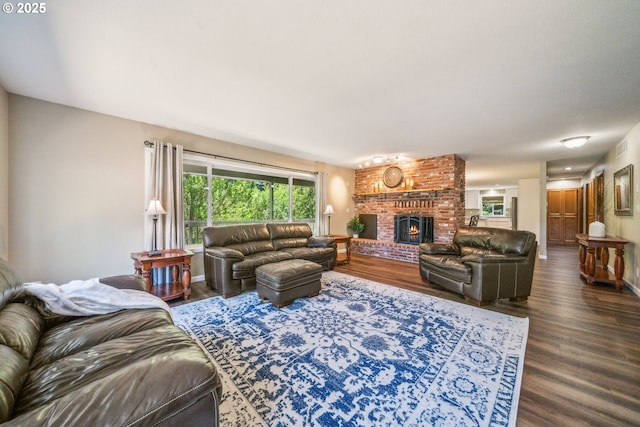 17476 SW Edy Rd, Sherwood, OR 97140 - living area featuring dark wood finished floors and a brick fireplace