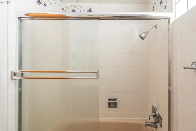 bathroom featuring enclosed tub / shower combo