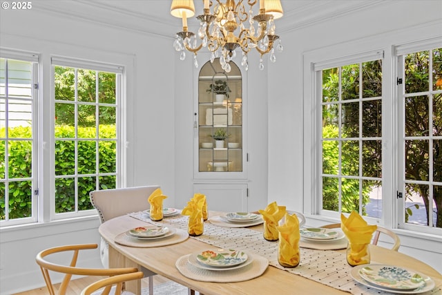 7311 SE 31st Ave, Portland, OR 97202 - dining area with ornamental molding and a chandelier