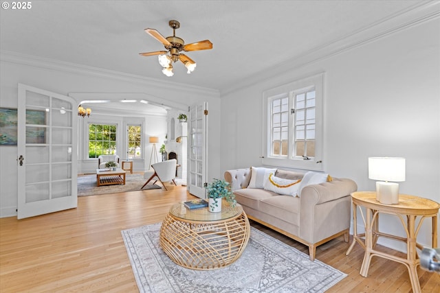 7311 SE 31st Ave, Portland, OR 97202 - living room featuring french doors, ornamental molding, light wood-style floors, and ceiling fan