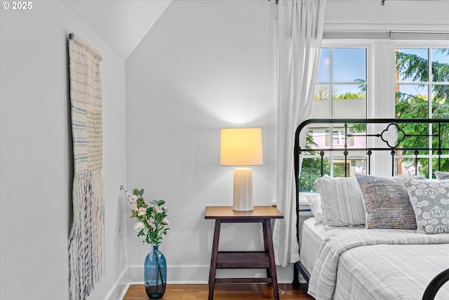 7311 SE 31st Ave, Portland, OR 97202 - bedroom with wood finished floors and lofted ceiling