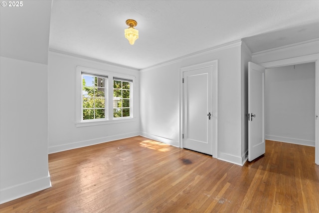 7311 SE 31st Ave, Portland, OR 97202 - unfurnished bedroom with crown molding and hardwood / wood-style flooring