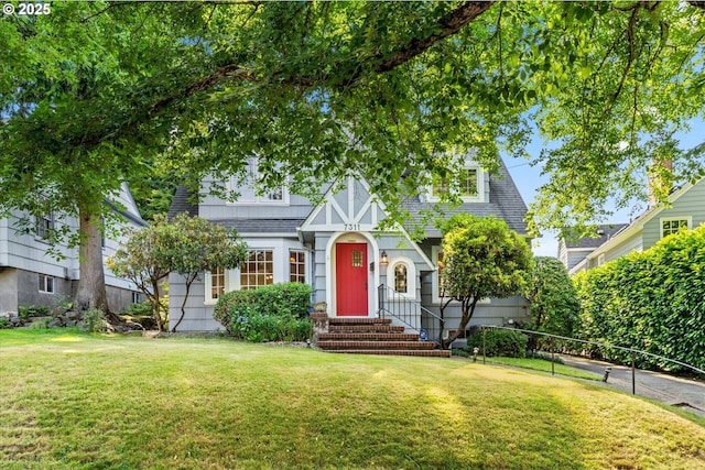 7311 SE 31st Ave, Portland, OR 97202 - tudor house with a front lawn and a shingled roof