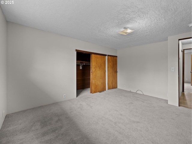 5327 SE Ogden St, Portland, OR 97206 - unfurnished bedroom with a textured ceiling and carpet
