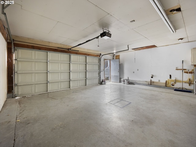 5327 SE Ogden St, Portland, OR 97206 - garage featuring a garage door opener