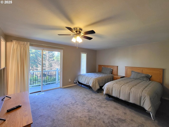 bedroom featuring access to exterior, ceiling fan, and carpet