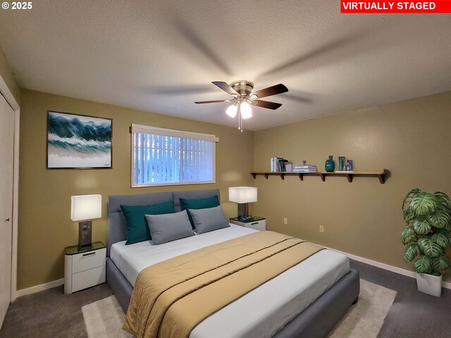 bedroom featuring a textured ceiling and ceiling fan