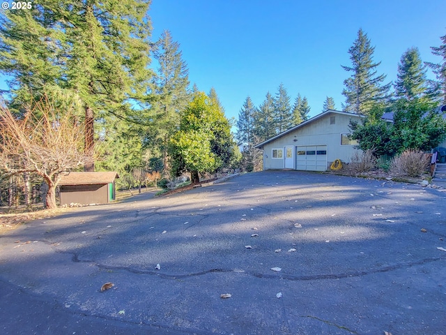 view of property exterior featuring a garage