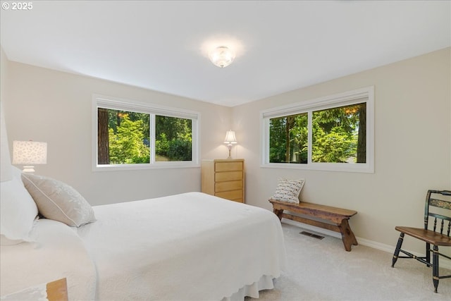 2308 Summit Dr, Lake Oswego, OR 97034 - bedroom featuring multiple windows and light colored carpet