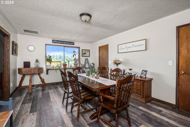 7896 State Highway 38, Drain, OR 97435 - dining room with dark wood-style flooring and a textured ceiling