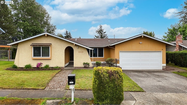 1919 SE 22nd Pl, Renton, WA 98055 - ranch-style home featuring a garage and driveway