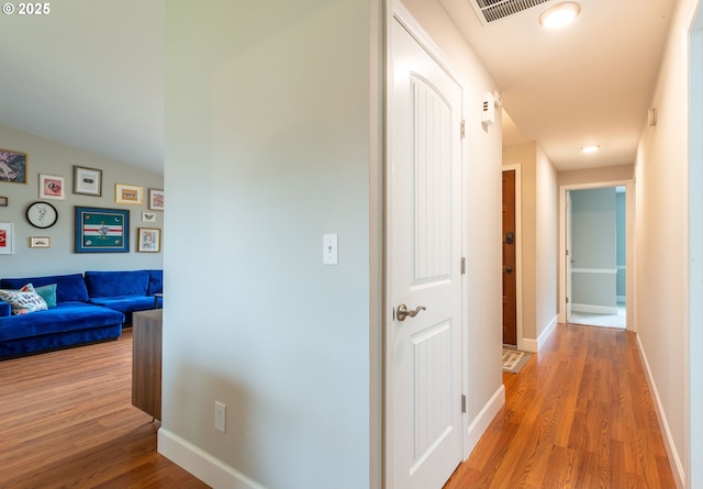 1919 SE 22nd Pl, Renton, WA 98055 - hallway with light wood-style flooring and baseboards