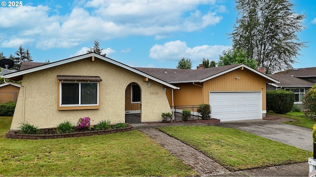 1919 SE 22nd Pl, Renton, WA 98055 - view of front of house featuring driveway, a garage, and stucco siding