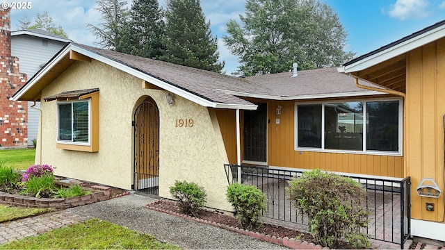 1919 SE 22nd Pl, Renton, WA 98055 - entrance to property with a shingled roof