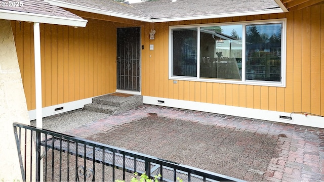 1919 SE 22nd Pl, Renton, WA 98055 - doorway to property with crawl space, roof with shingles, and a patio
