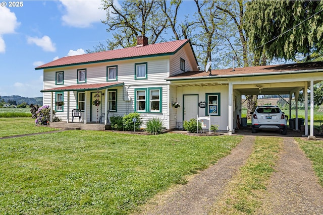 81052 Davisson Rd, Creswell, OR 97426 - view of front facade with dirt driveway, a front yard, a chimney, covered porch, and metal roof