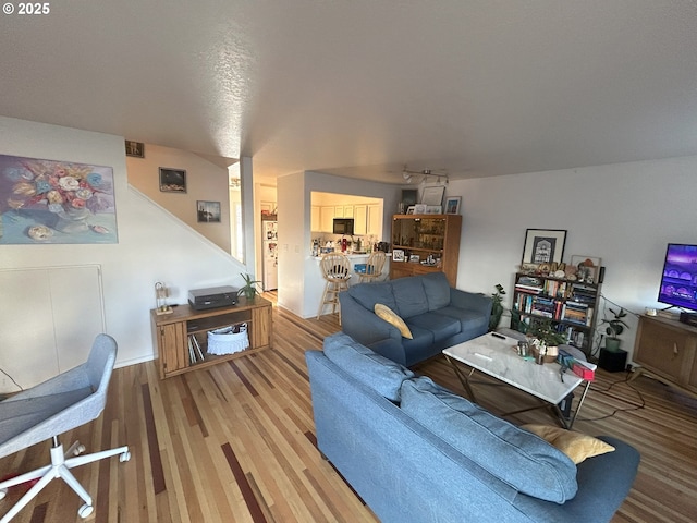 living room with hardwood / wood-style floors