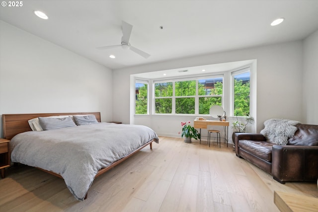 bedroom with light wood-style floors, recessed lighting, and ceiling fan