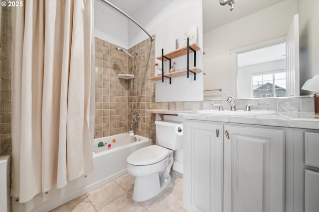 full bath with vanity, tile patterned flooring, toilet, and shower / bathtub combination with curtain