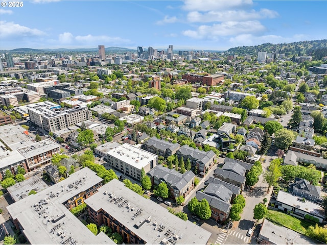 birds eye view of property with a city view