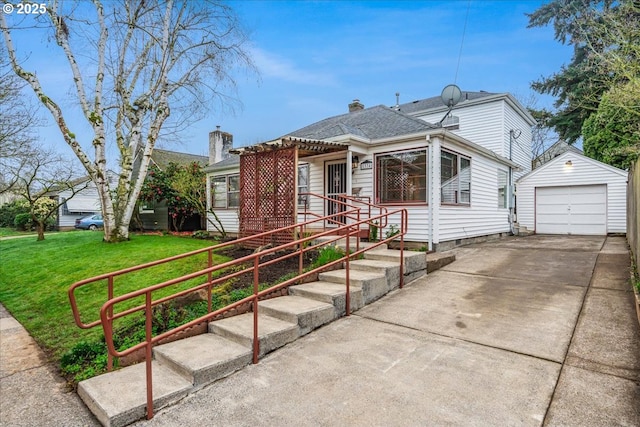 view of front of home featuring an outdoor structure, concrete driveway, a detached garage, a front lawn, and a pergola