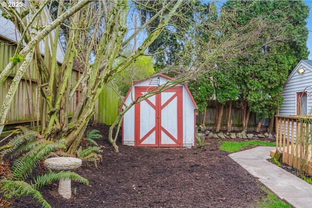 view of shed featuring a fenced backyard
