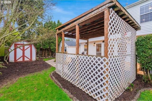 view of shed with fence