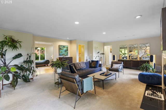 living room featuring light carpet, recessed lighting, and crown molding