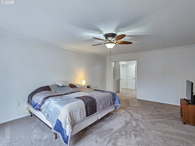 carpeted bedroom with a ceiling fan, a textured ceiling, baseboards, and crown molding