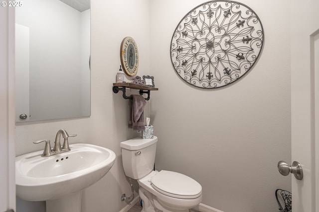 1850 NW Landon St, Mcminnville, OR 97128 - half bath featuring baseboards, toilet, and a sink
