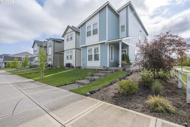 1850 NW Landon St, Mcminnville, OR 97128 - view of front of property with a residential view, cooling unit, and board and batten siding